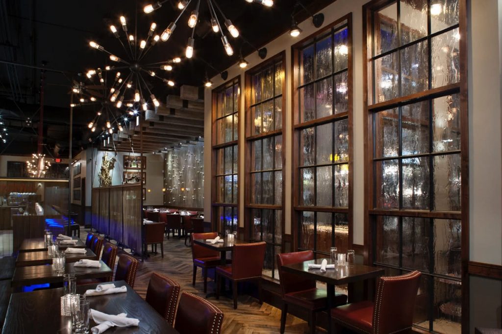 Posana Restaurant Seating Area Interior Design - Services Included Space Planning, Ceiling & Lighting Design, Finishes, Furniture, Accessories